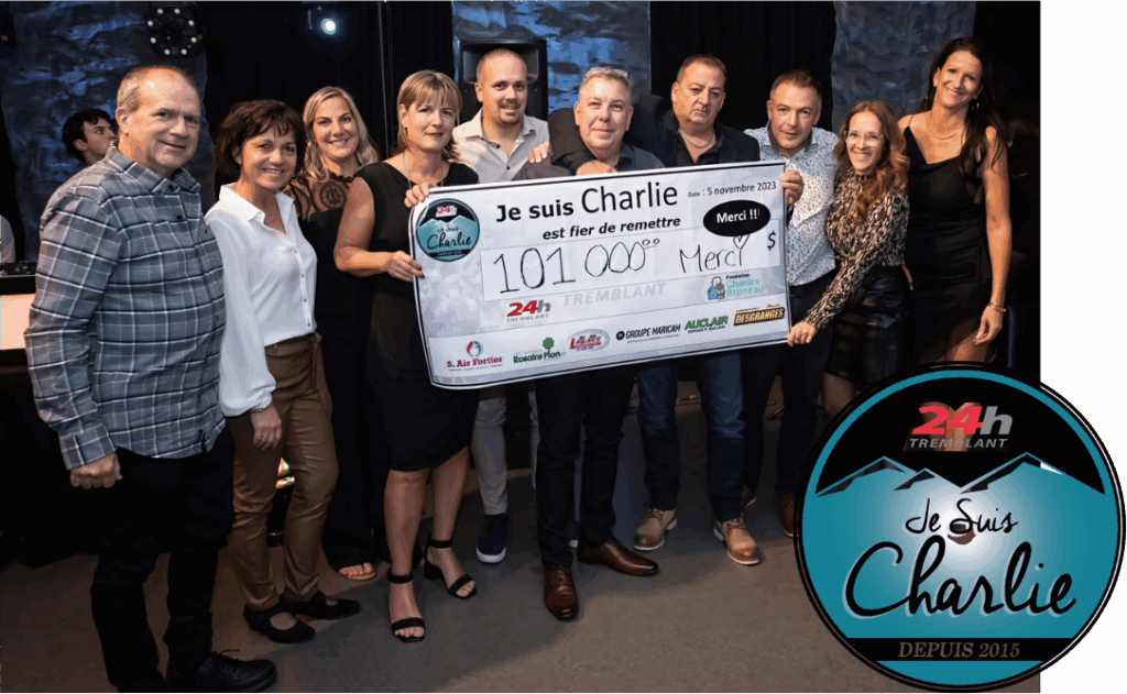 L’équipe de S. Air Fortier remet un chèque de 101 000 $ au mouvement Je suis Charlie lors d’un événement caritatif, illustrant l’engagement communautaire de l’entreprise.